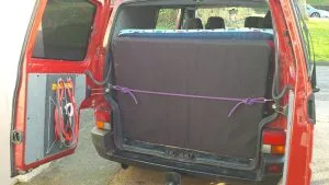 Bouldering mats fit across the van just inside the rear doors