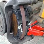 The new brake pads in place, with a smear of copper grease to stop squealing