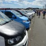 VW Camper vans line the seafront in Paignton