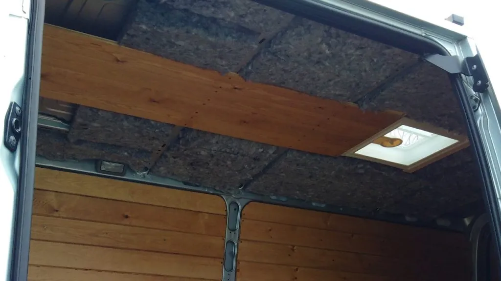 The first four wood panels are in place