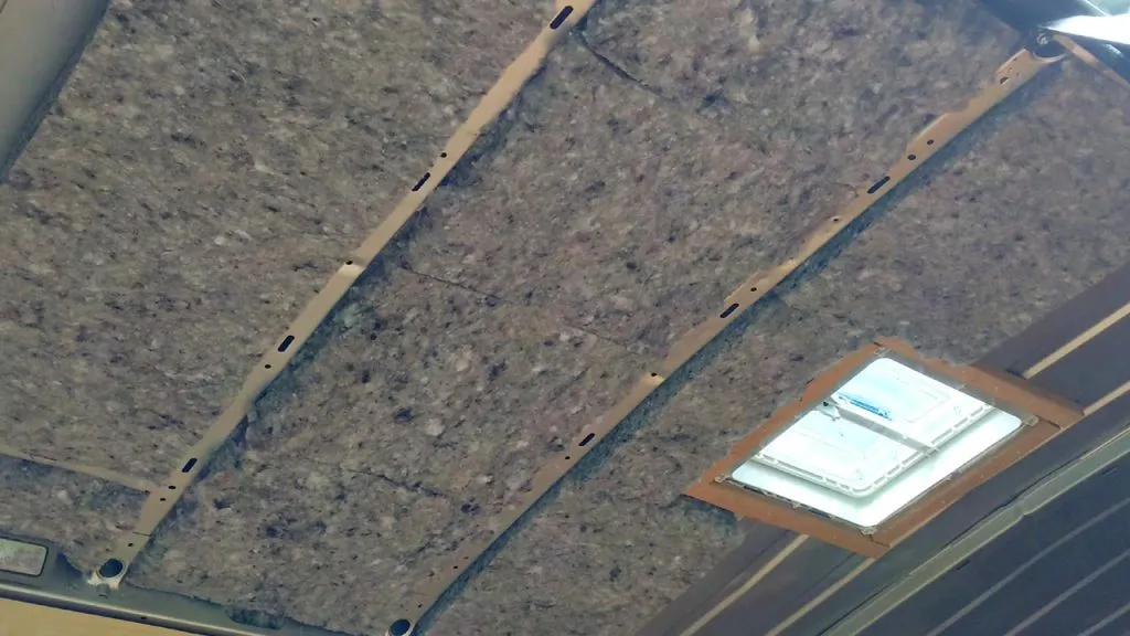 Recycled plastic insulation stuck to the roof