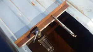 Clamping the perspex to reform the roof ridges and channels