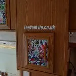 Stickerbombed the middle of the door panels - and added my own website sticker too!