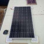 The 150 watt solar panel in place on the roof